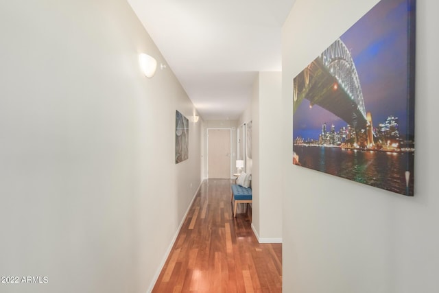 corridor featuring hardwood / wood-style floors