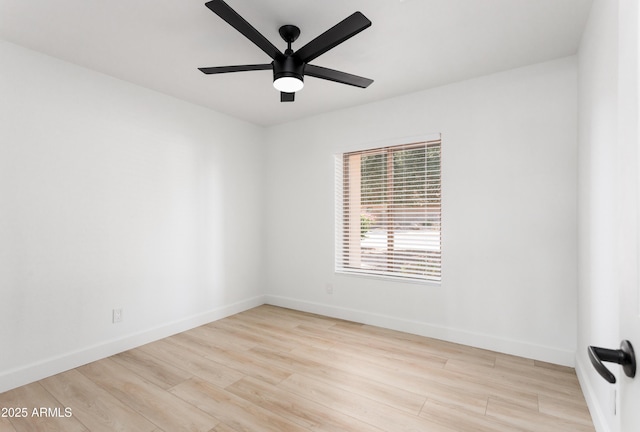unfurnished room featuring wood finished floors, baseboards, and a ceiling fan