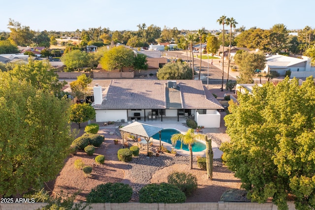 aerial view of residential area featuring a pool