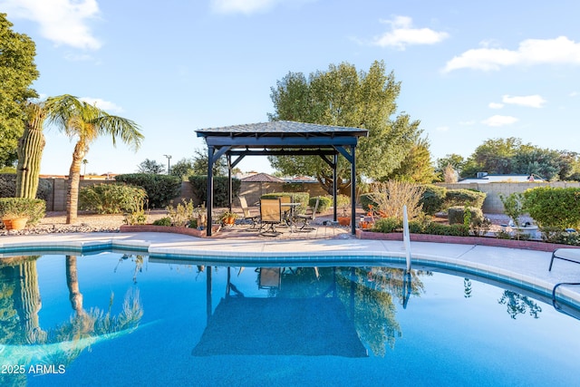 view of swimming pool with a gazebo, a fenced backyard, and a patio