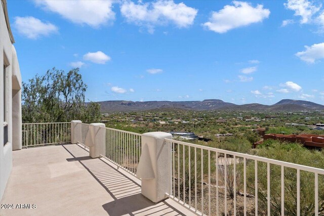 balcony featuring a mountain view