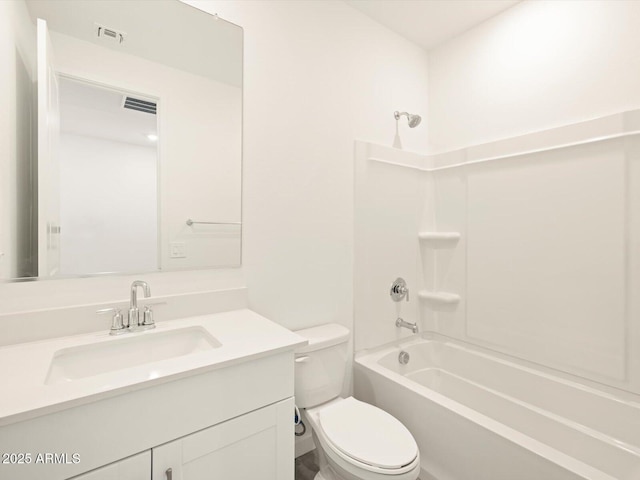 full bathroom with toilet, vanity, and  shower combination