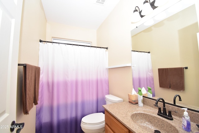 9145 W Menadota Dr, Peoria, AZ 85382 - full bath with a shower with shower curtain, vanity, visible vents, and toilet