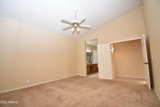 9145 W Menadota Dr, Peoria, AZ 85382 - unfurnished room featuring baseboards, light colored carpet, a ceiling fan, and lofted ceiling