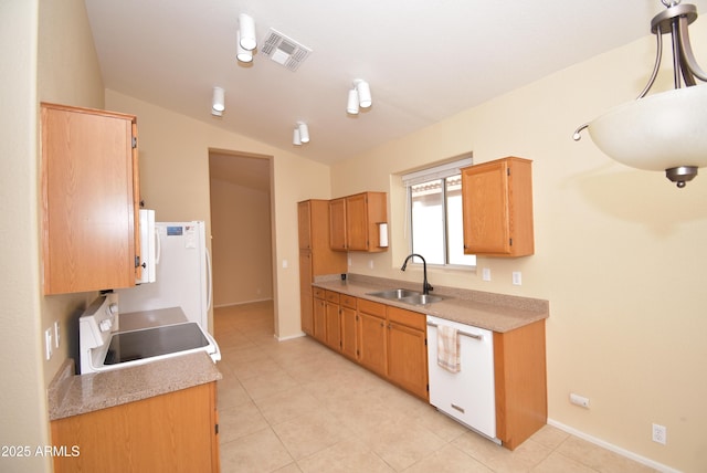 9145 W Menadota Dr, Peoria, AZ 85382 - kitchen featuring a sink, visible vents, light countertops, and white appliances