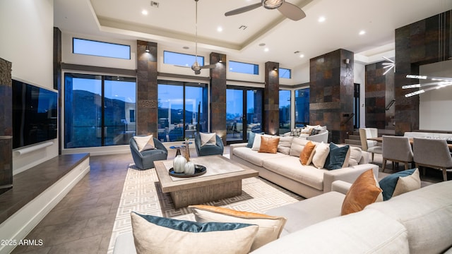 1805 E Rocky Slope Dr, Phoenix, AZ 85048 - living area with recessed lighting, a tray ceiling, a high ceiling, and a ceiling fan