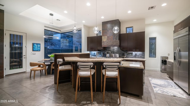 1805 E Rocky Slope Dr, Phoenix, AZ 85048 - kitchen with stainless steel built in refrigerator, visible vents, and modern cabinets