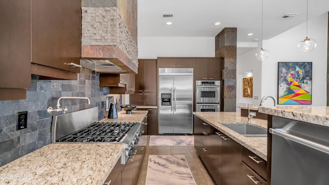1805 E Rocky Slope Dr, Phoenix, AZ 85048 - kitchen featuring a sink, stainless steel appliances, tasteful backsplash, and visible vents
