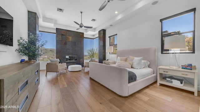 1805 E Rocky Slope Dr, Phoenix, AZ 85048 - bedroom featuring multiple windows, visible vents, and light wood finished floors