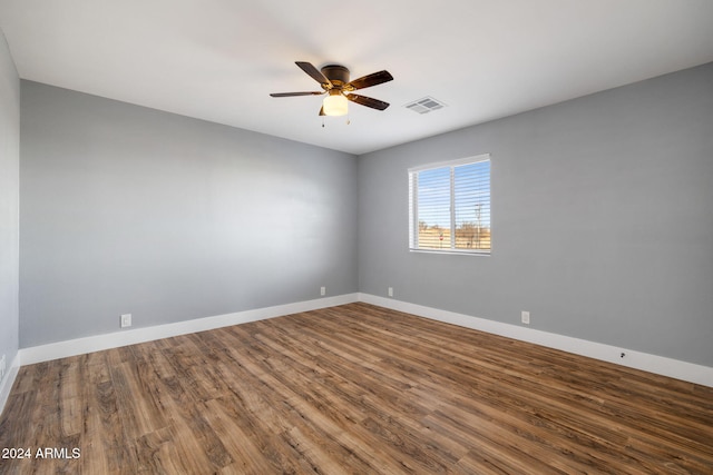 unfurnished room featuring hardwood / wood-style flooring and ceiling fan