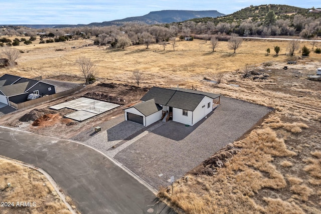 bird's eye view with a mountain view