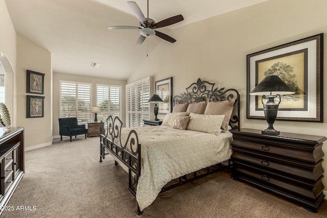 carpeted bedroom with lofted ceiling and ceiling fan