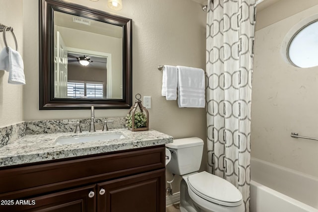 full bathroom with toilet, shower / tub combo with curtain, and vanity