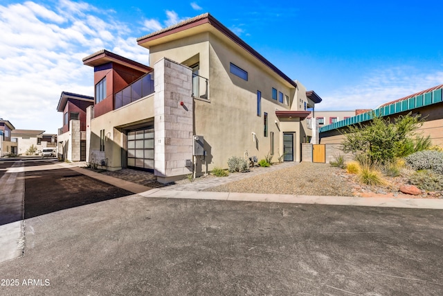 view of home's exterior with a garage