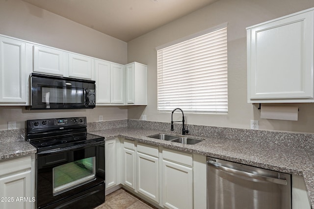 kitchen featuring white cabinetry, sink, and black appliances