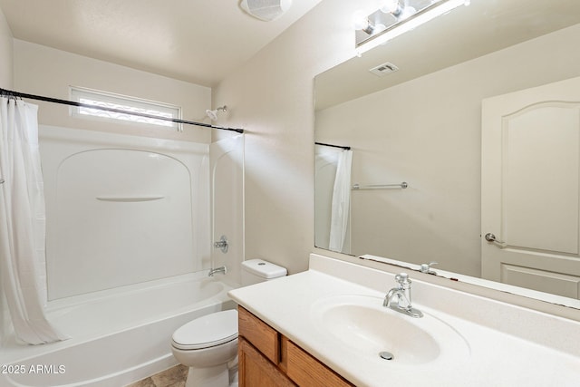 full bathroom with vanity, toilet, and shower / bath combo