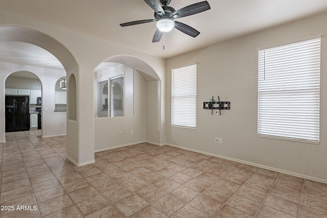 spare room featuring ceiling fan