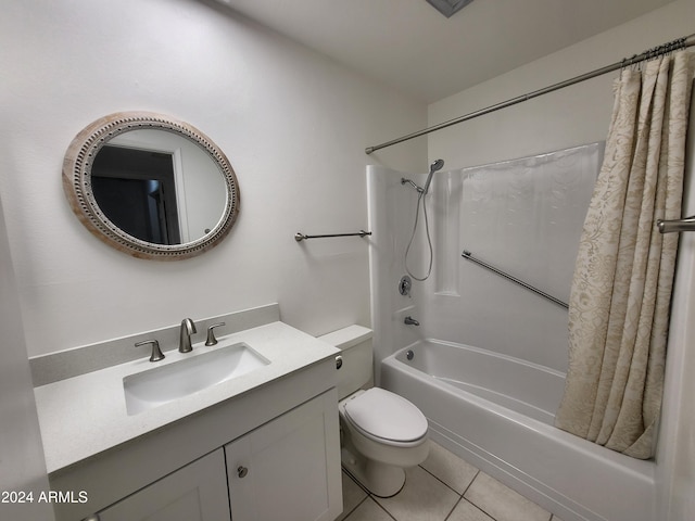 full bathroom featuring tile patterned flooring, shower / tub combo, vanity, and toilet