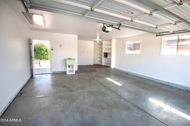 garage featuring a garage door opener