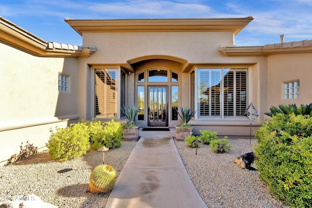 doorway to property featuring french doors