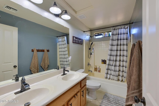 full bath featuring a sink, tile patterned floors, shower / bath combination with curtain, and visible vents