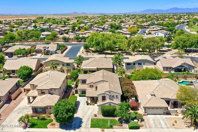 birds eye view of property featuring a residential view and a mountain view