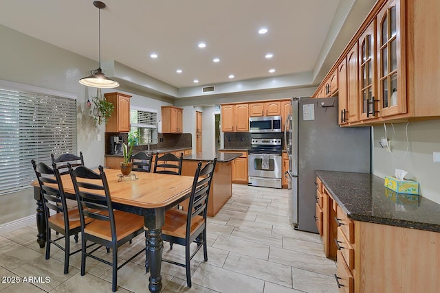 dining room featuring recessed lighting and visible vents