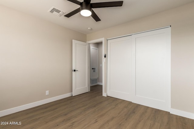 7508 E Beatrice St, Scottsdale, AZ 85257 - unfurnished bedroom with wood finished floors, visible vents, and baseboards