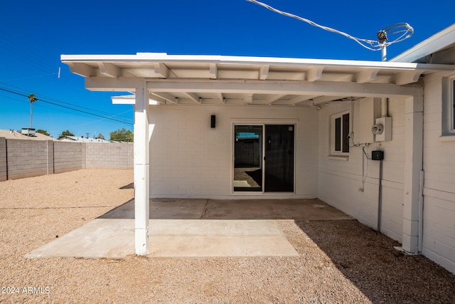 doorway to property featuring a patio