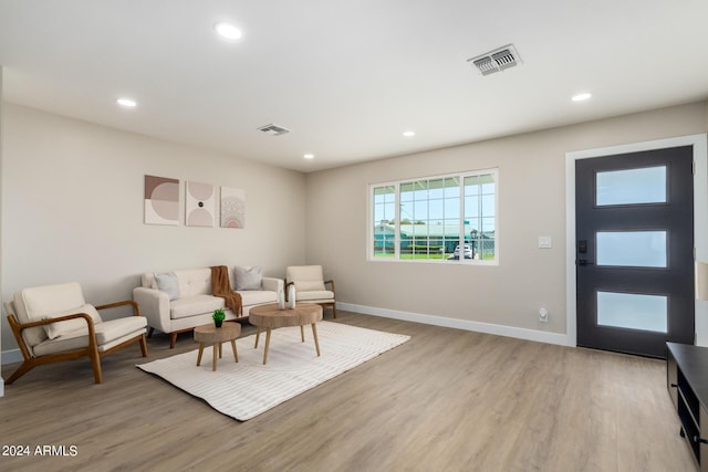 7508 E Beatrice St, Scottsdale, AZ 85257 - living area with baseboards, visible vents, recessed lighting, and light wood-style floors
