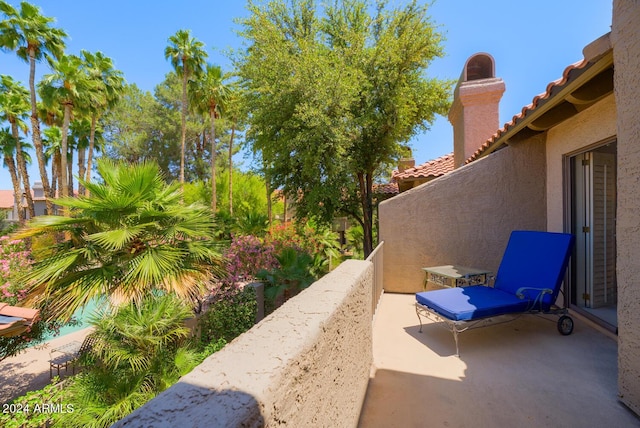 view of patio / terrace with a balcony