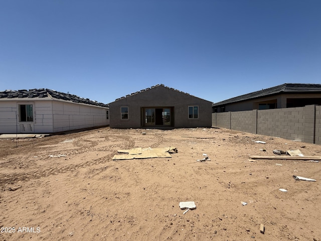4517 S 95th Dr, Tolleson, AZ 85353 - rear view of house with fence and stucco siding