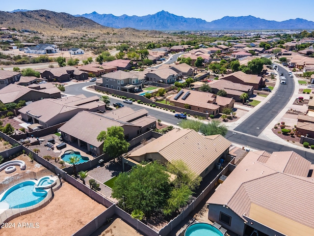 birds eye view of property featuring a mountain view