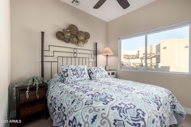 bedroom with ceiling fan, carpet flooring, and visible vents