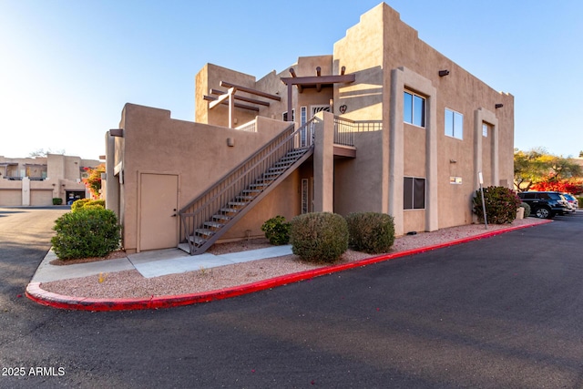 view of building exterior featuring stairway