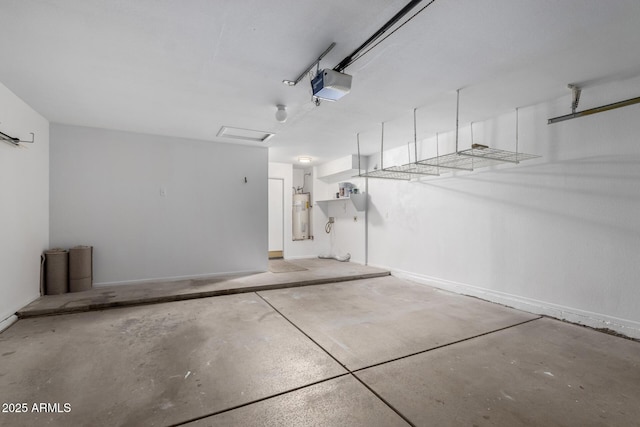 garage featuring a garage door opener and water heater