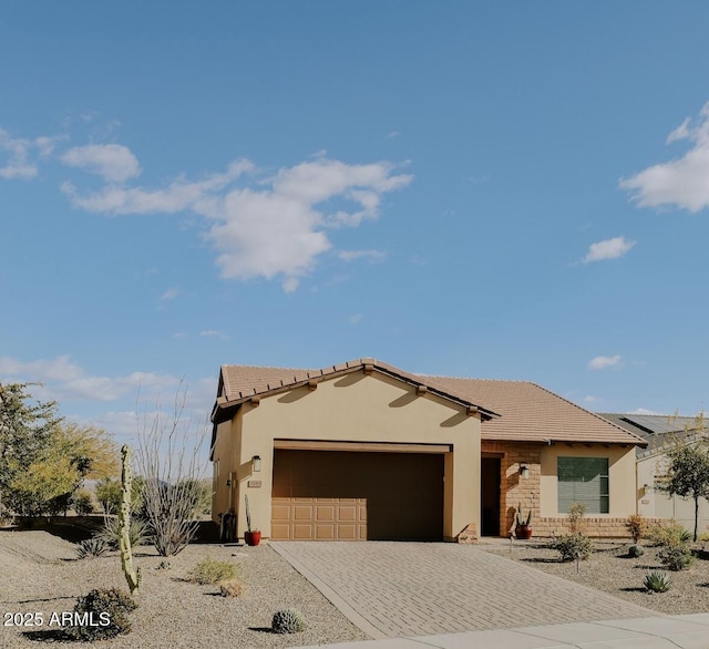 view of front of property featuring a garage