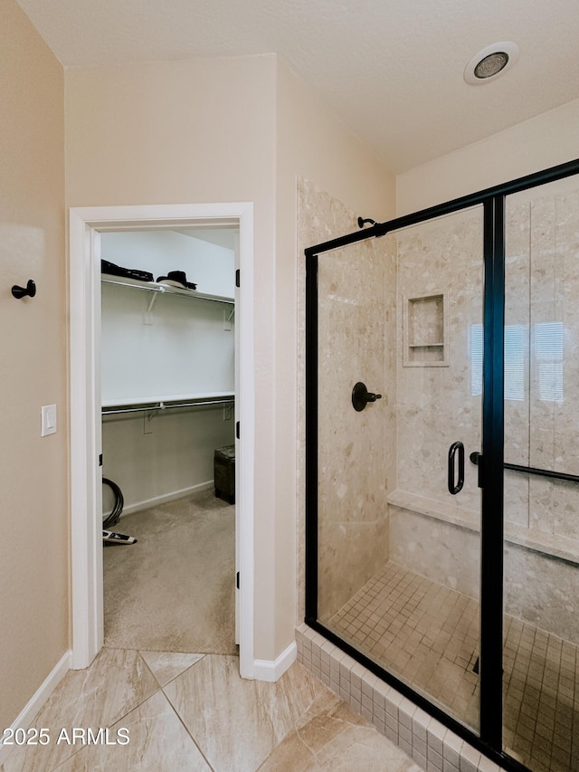 bathroom with an enclosed shower