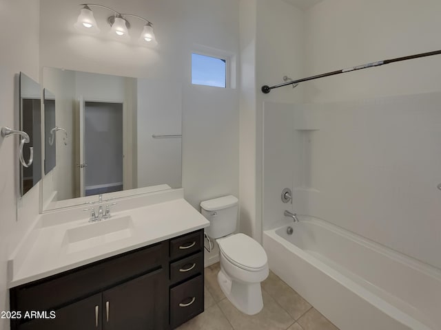 full bathroom with tile patterned flooring, vanity, bathing tub / shower combination, and toilet