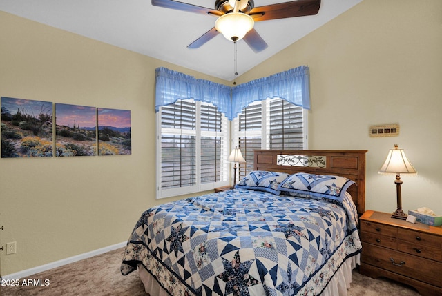 bedroom with ceiling fan, light colored carpet, and lofted ceiling