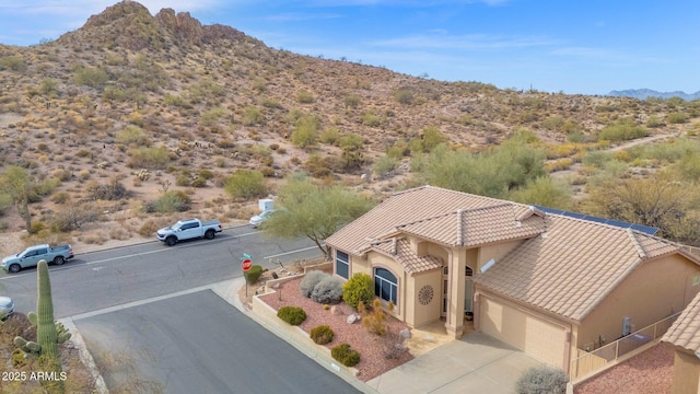 drone / aerial view featuring a mountain view