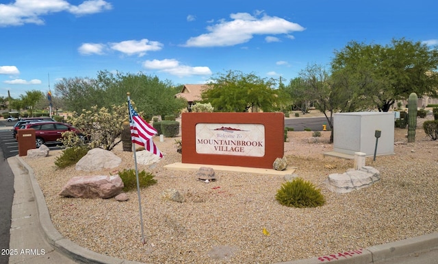 view of community sign