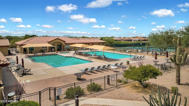 view of swimming pool featuring a patio area