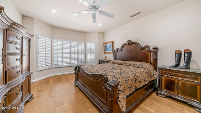 bedroom with a ceiling fan, light wood-style floors, baseboards, visible vents, and recessed lighting