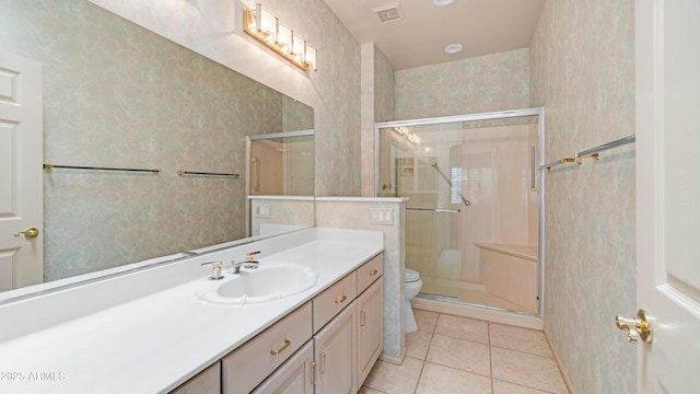 full bath with a shower stall, visible vents, tile patterned flooring, and toilet