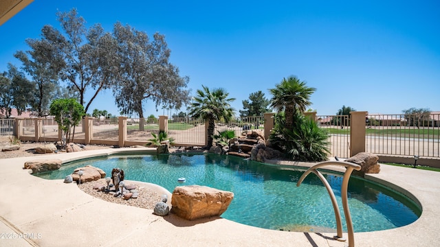 view of pool with fence and a fenced in pool