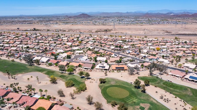 bird's eye view with a mountain view, golf course view, and a residential view