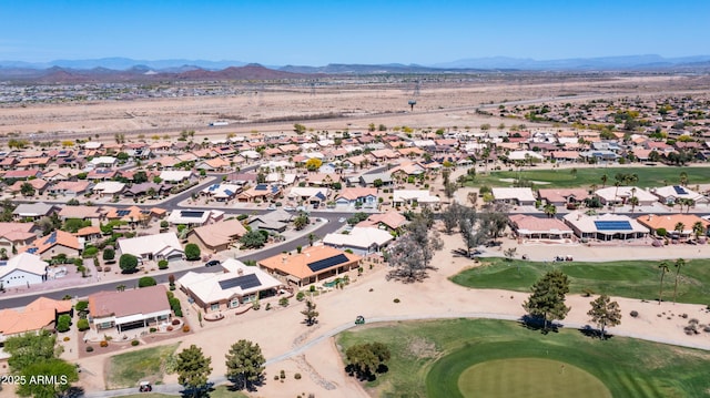 bird's eye view featuring a residential view, golf course view, and a mountain view