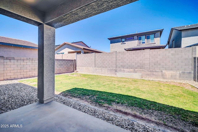 view of yard featuring a fenced backyard and a patio area