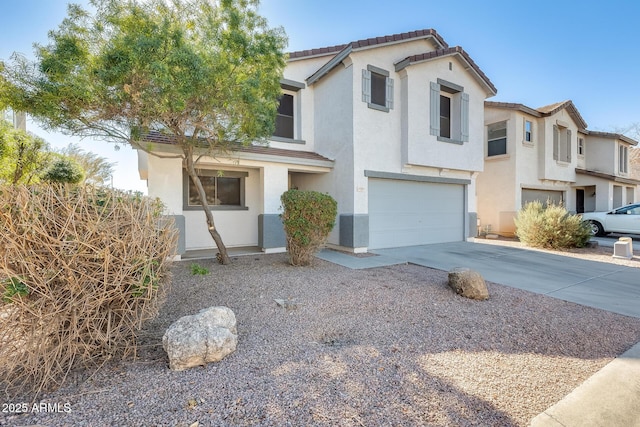 view of front of property with a garage